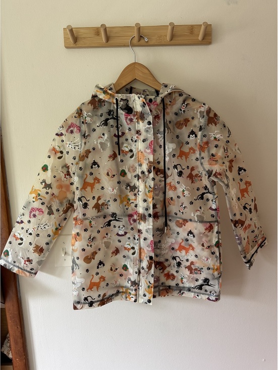 Disney Jackets & Blazers - Disney Cats and dogs clear hooded Raincoat size XS